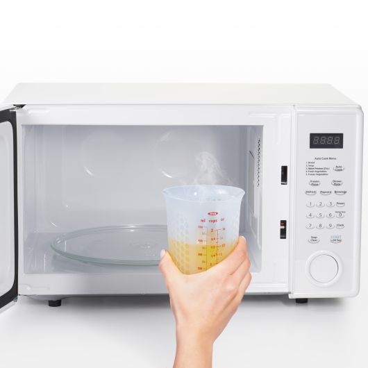 Tasse à mesurer Presser-Verser en silicone Oxo